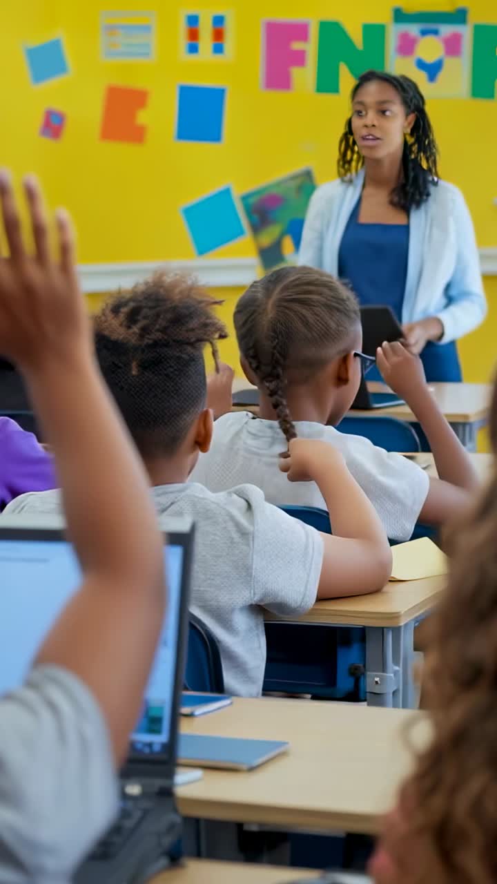 Vertical video: Teacher posing question in classroom, scanning students raising hands with tablet