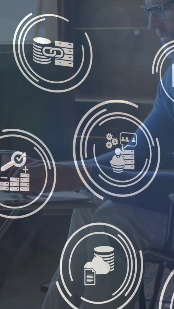 Animation of digital icons over caucasian man using laptop at home