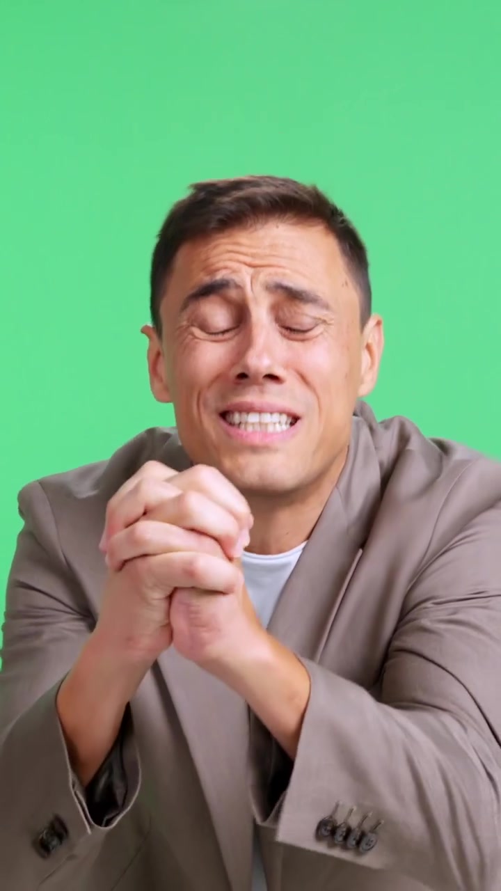 Desperate man pleading and begging on green screen background