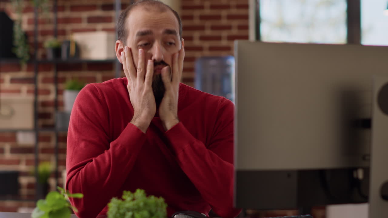 Exhausted stressed man working on marketing analysis