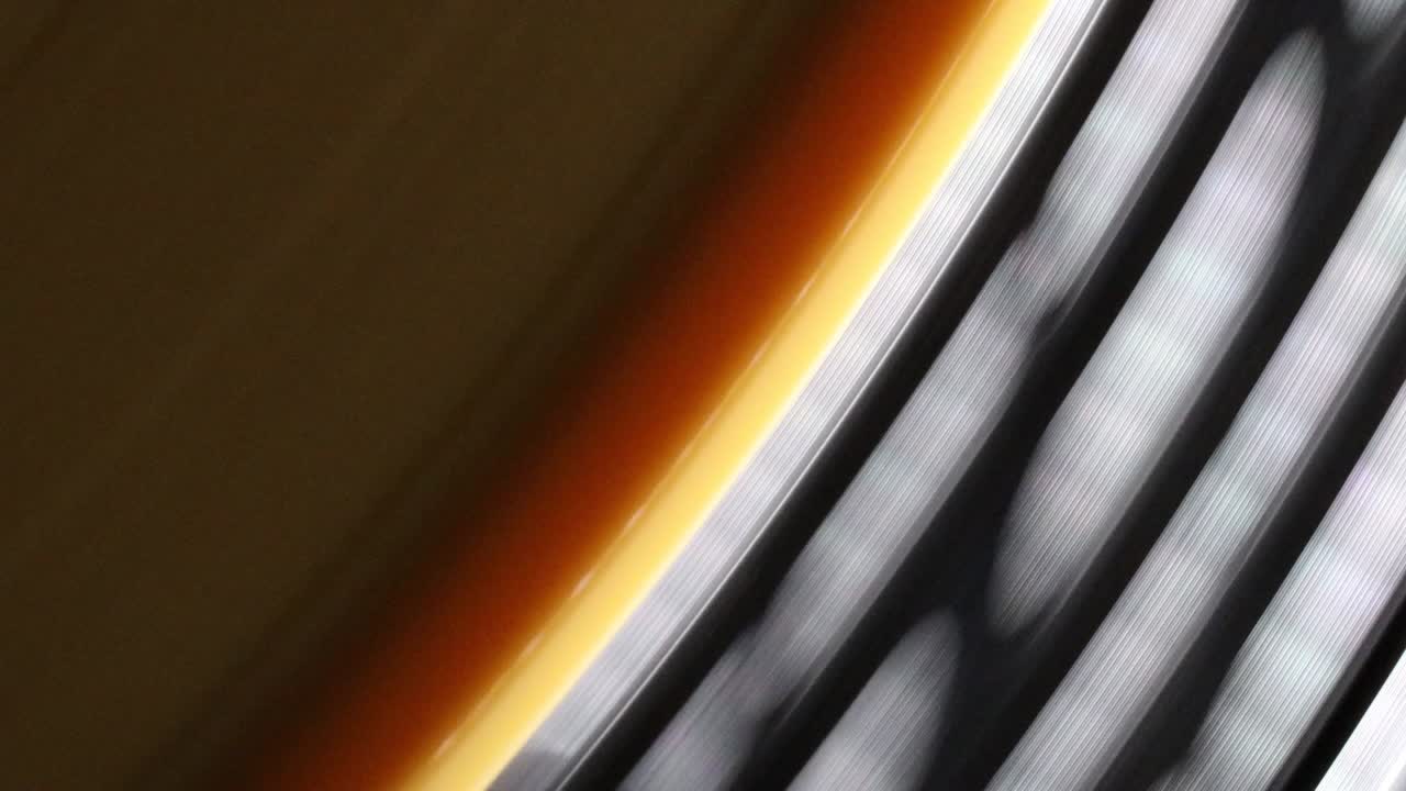 Yellow vinyl record playing macro close up