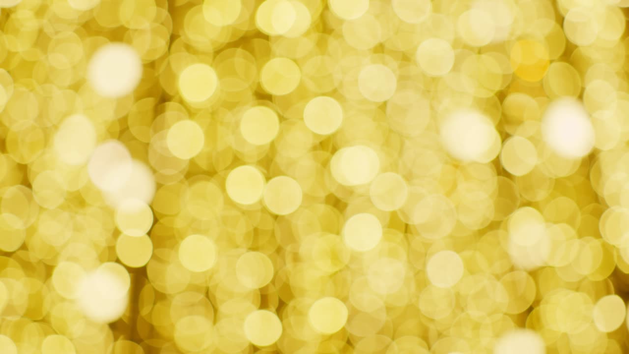 추상적인 황금색 보케 (bokeh) 의 멋진 장식적인 빛의 배경
