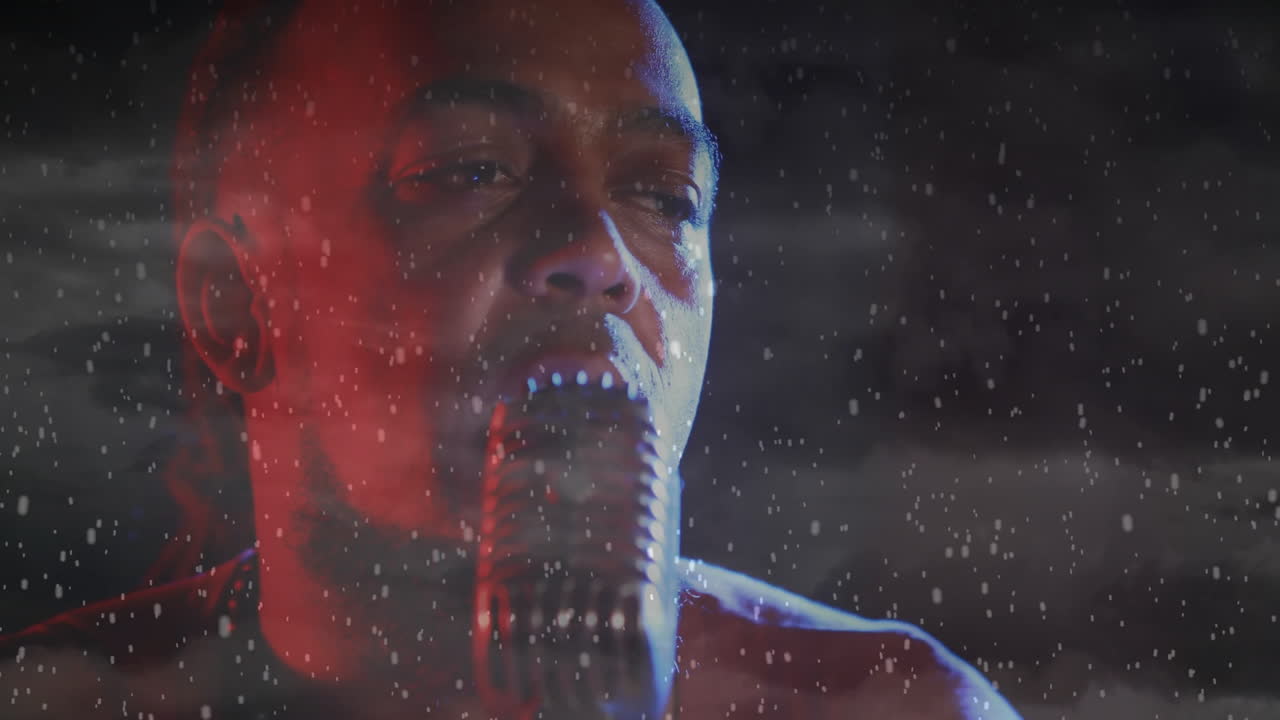 male singer singing into vintage microphone, using raindrop overlay, boosting music production