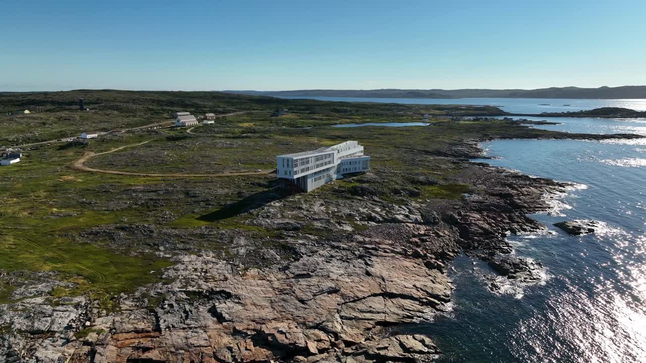 Fogo Island Inn with Orbital Aerial Drone Shot Along the Rocky Coastline at Joe Batt's Arm on Fogo Island in Canada