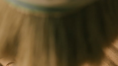 close-up view of wood carving process