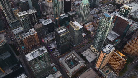 high angle drone shot overlooking the skyscrapers in downtown austin, evening