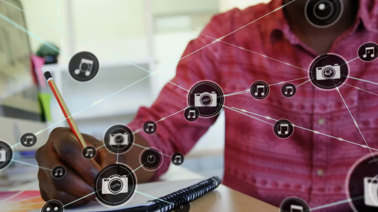 animación de la red de conexiones con iconos de la cámara sobre empresario afroamericano