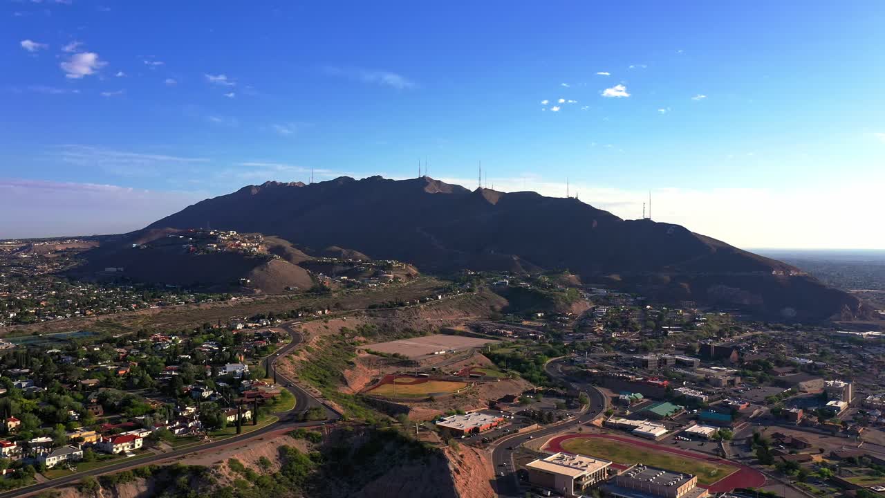 Flying toward Franklin Mountains in El Paso, Texas. Near Border wall and Cesar E. Chavez Border Highway (375) in El Paso before Title 42 Ends. 4k Drone Footage. Near Mexico.