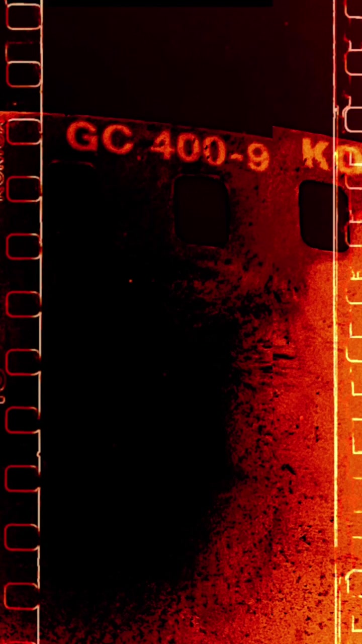 Vintage 35mm Film Strip Texture with Red Light Leak