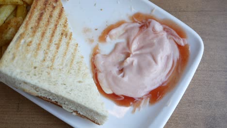 grilled cheese sandwich with fries and ketchup