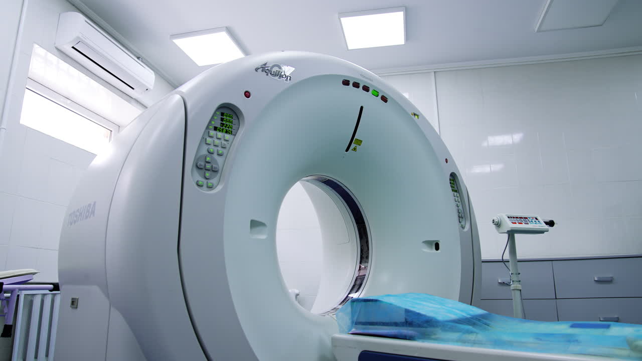 Empty machine for magnetic resonance scanning. Approaching the top of the machine with its logo on.