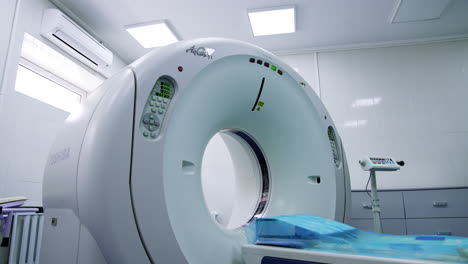 empty machine for magnetic resonance scanning. approaching the top of the machine with its logo on.