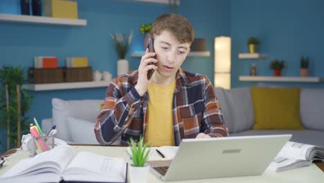 The-student-who-was-upset-by-the-news-he-received-on-the-phone.