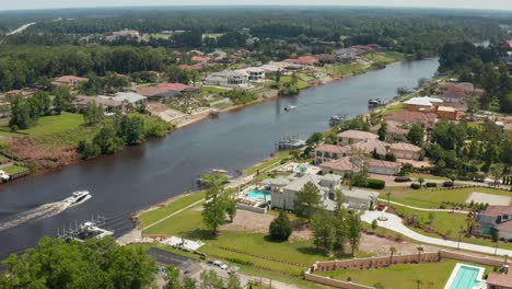 Boat-owners-on-Grand-Strand-of-Intracoastal-Waterway-through-Myrtle-Beach-South-Carolina,-SC,-USA