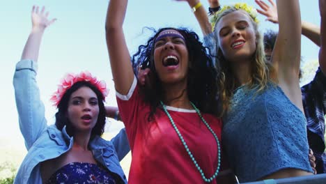 female friends having fun at music festival 4k