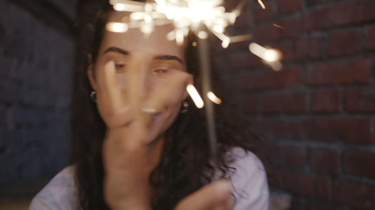 Young Woman with Sparkler