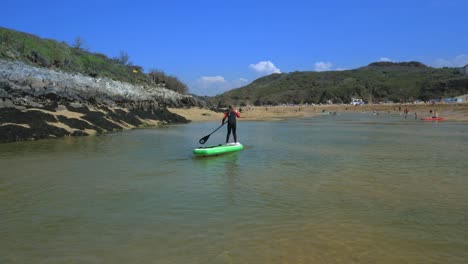 Young-girl-paddleboarding-using-awe-2