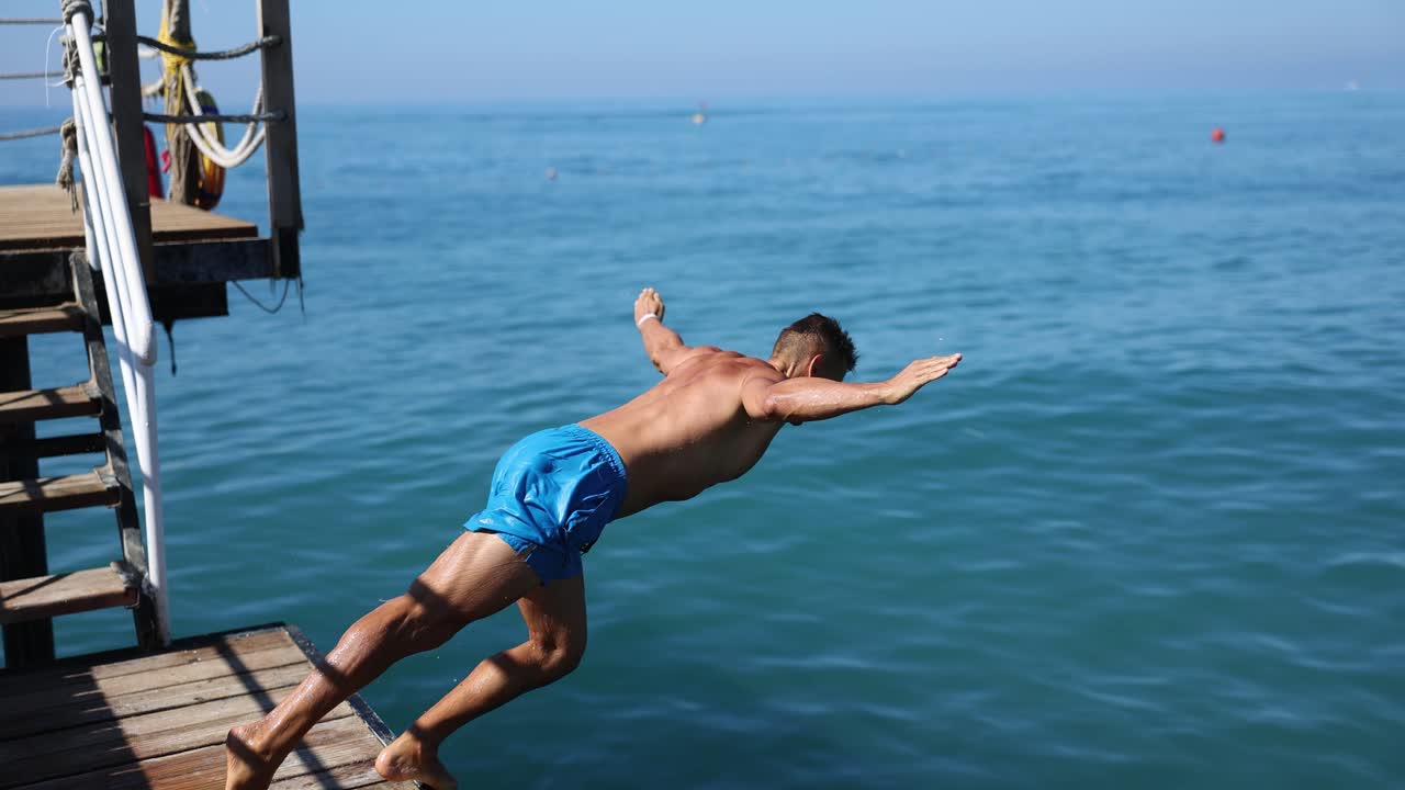 Man diving into the ocean