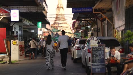 pedestrians and vehicles in a busy market