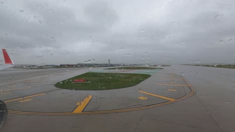 a commercial plane flying through the fog and rain to a safe landing - hyper lapse window view