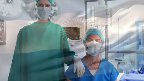 Animation-of-waving-argentina-flag-against-caucasian-male-and-female-surgeons-at-hospital