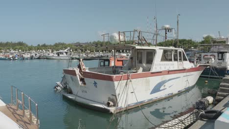 A-Fishing-Boat-Moored-At-Tamsui-Fisherman's-Wharf,-Taipei