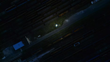 still of the dark, there’s a peaceful sound, the siding sleeps, with no trains around
