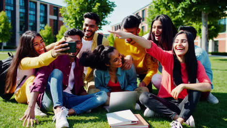 happy and diverse group of students socializing on university campus