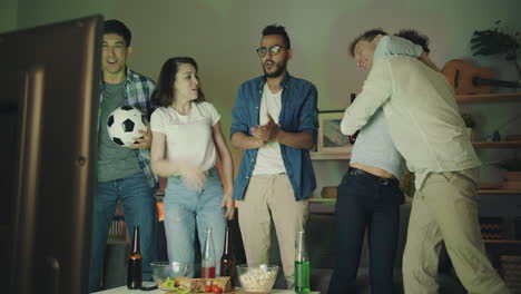 friends celebrating a soccer game victory