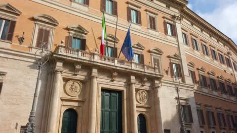 Main-entrance-of-Palazzo-Montecitorio,-a-palace,-seat-of-the-Chamber-of-Deputies,-the-lower-house-of-the-Italian-Parliament