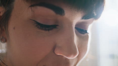 Woman-eyes-looking-camera-extreme-closeup.-Happy-girl-face-emotions-portrait