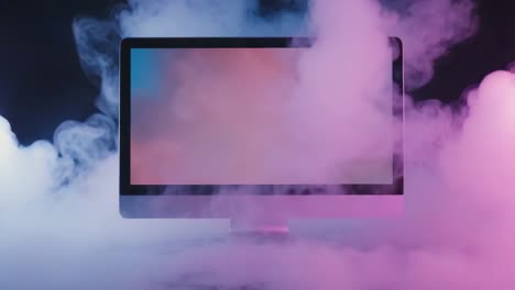 computer monitor surrounded by smoke