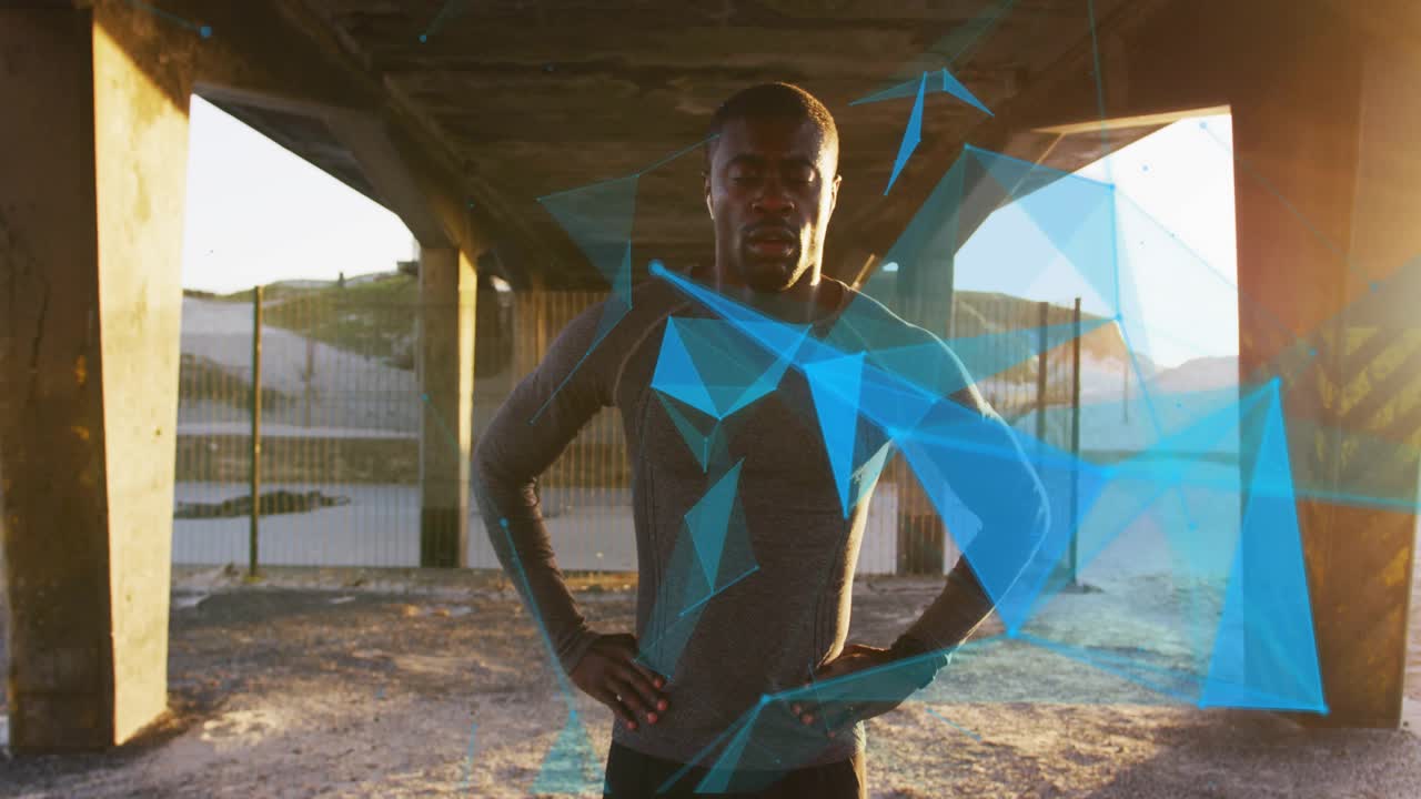 Man walking under overpass toward camera, starting tech particles circling chest, revealing watch