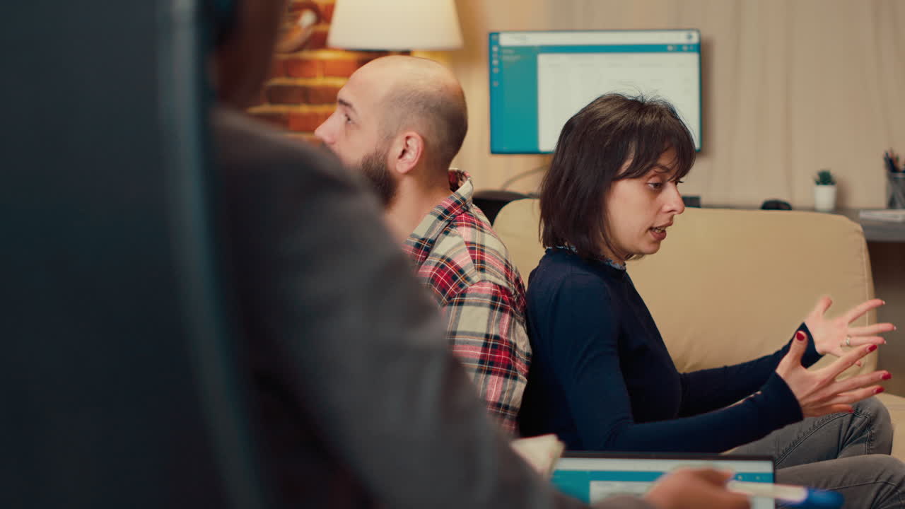 Married people having argument at couple therapy session