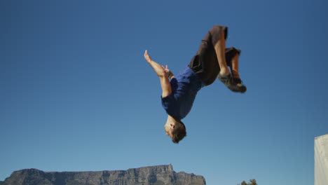 caucasian man practicing parkour