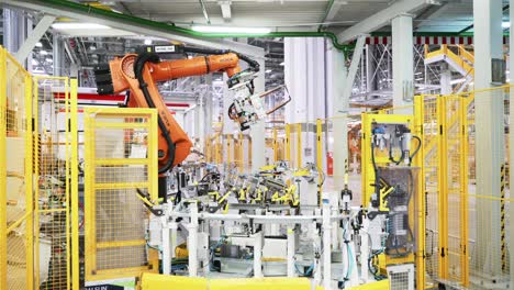 automated manufacturing process with robotic arm