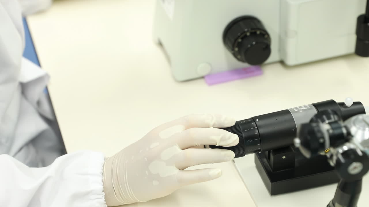 Scientist woman with gloves medicine Development Laboratory using microscope in modern laboratory setting, perfect for science education and research