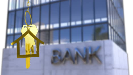 animation of key in house keychain over bank text on modern building