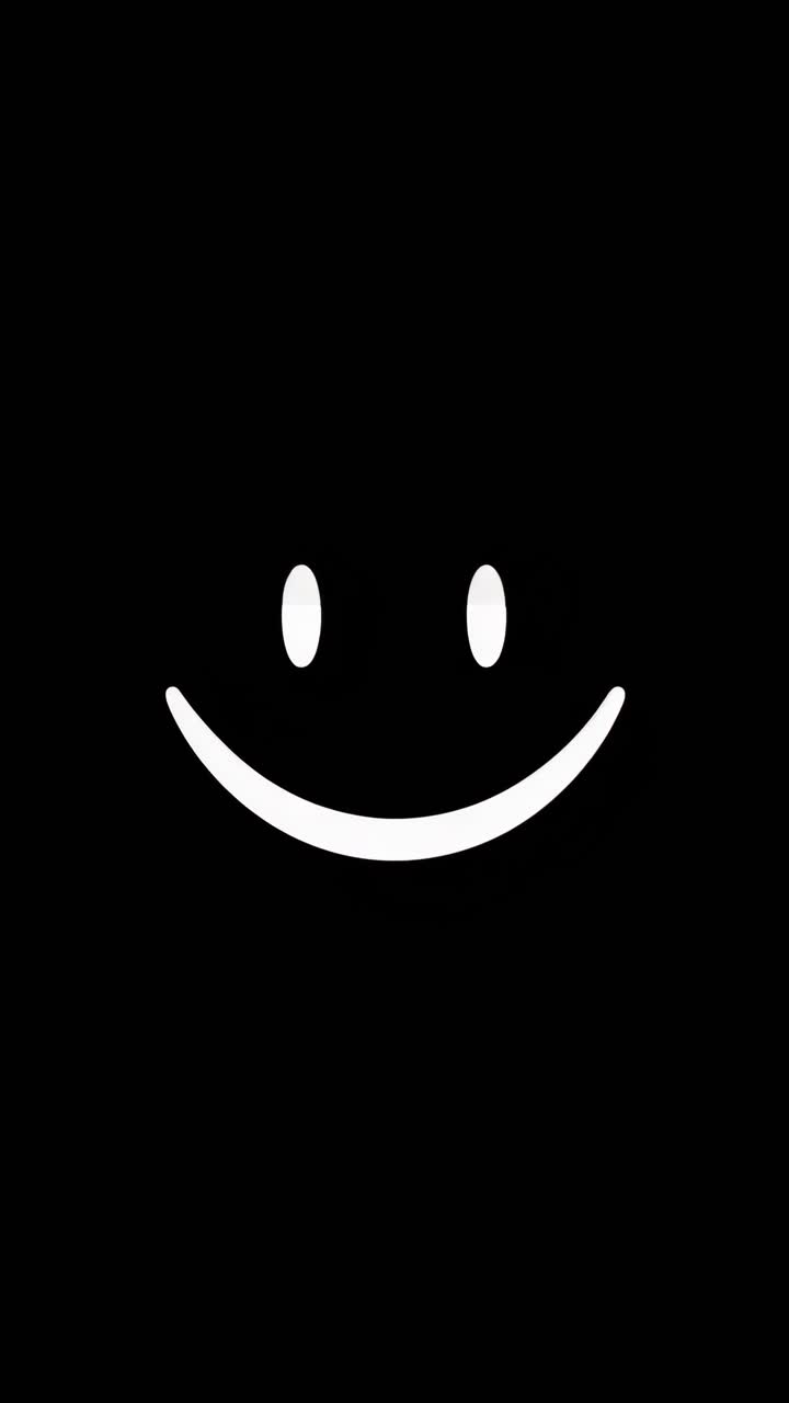 Video concettuale minimalista con sfondo nero e una faccina sorridente bianca