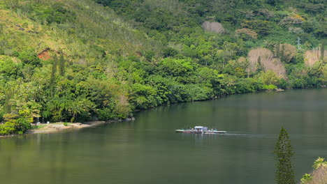 passenger ferry crosses ouaieme river