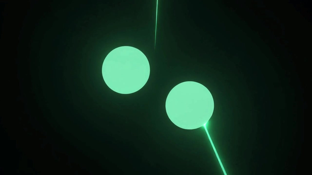 光る緑色の球体とレーザービームの抽象アニメーション