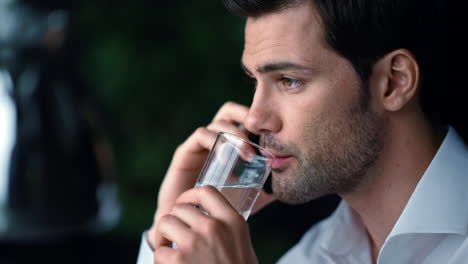 businessman face calling on smartphone. male entrepreneur using cellphone