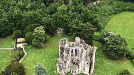 aerial view of old wardour castle and surrounding parkland, heritage site in english countryside