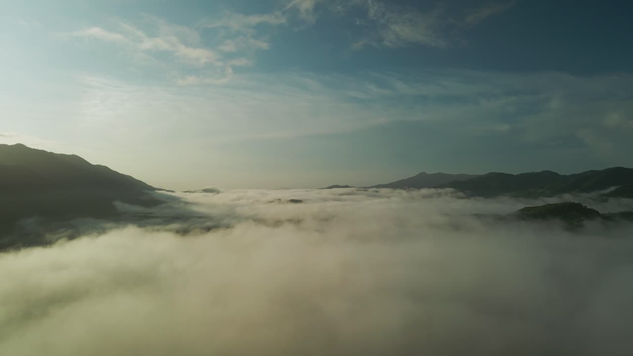 Flight over the mist in the sunset time, Costa Rica