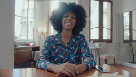 pov young black businesswoman having video call in office