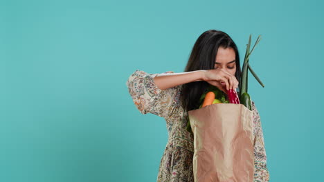 sustainable living person inspecting groceries