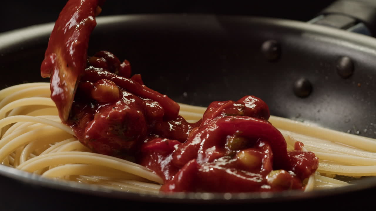 Cooking Spaghetti with Tomato Sauce