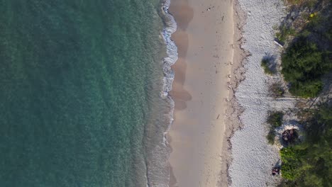 waves on white sand beach