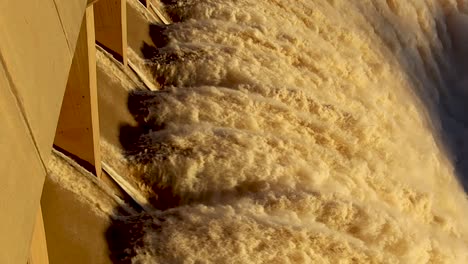 Dam-overflow-rushing-with-water,-hydraulic-jump-for-energy-dissipation-HD-30fps