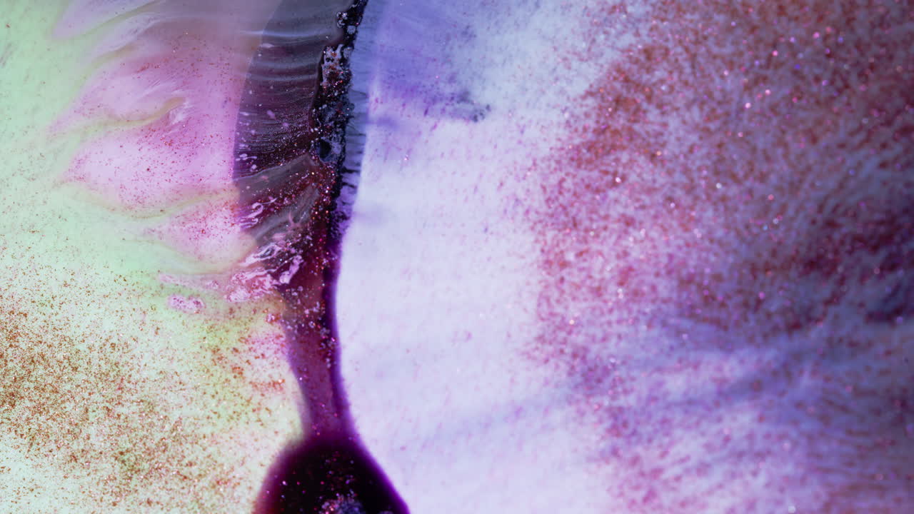 una imagen abstracta de primer plano con colores y texturas vibrantes con una dinámica fluida